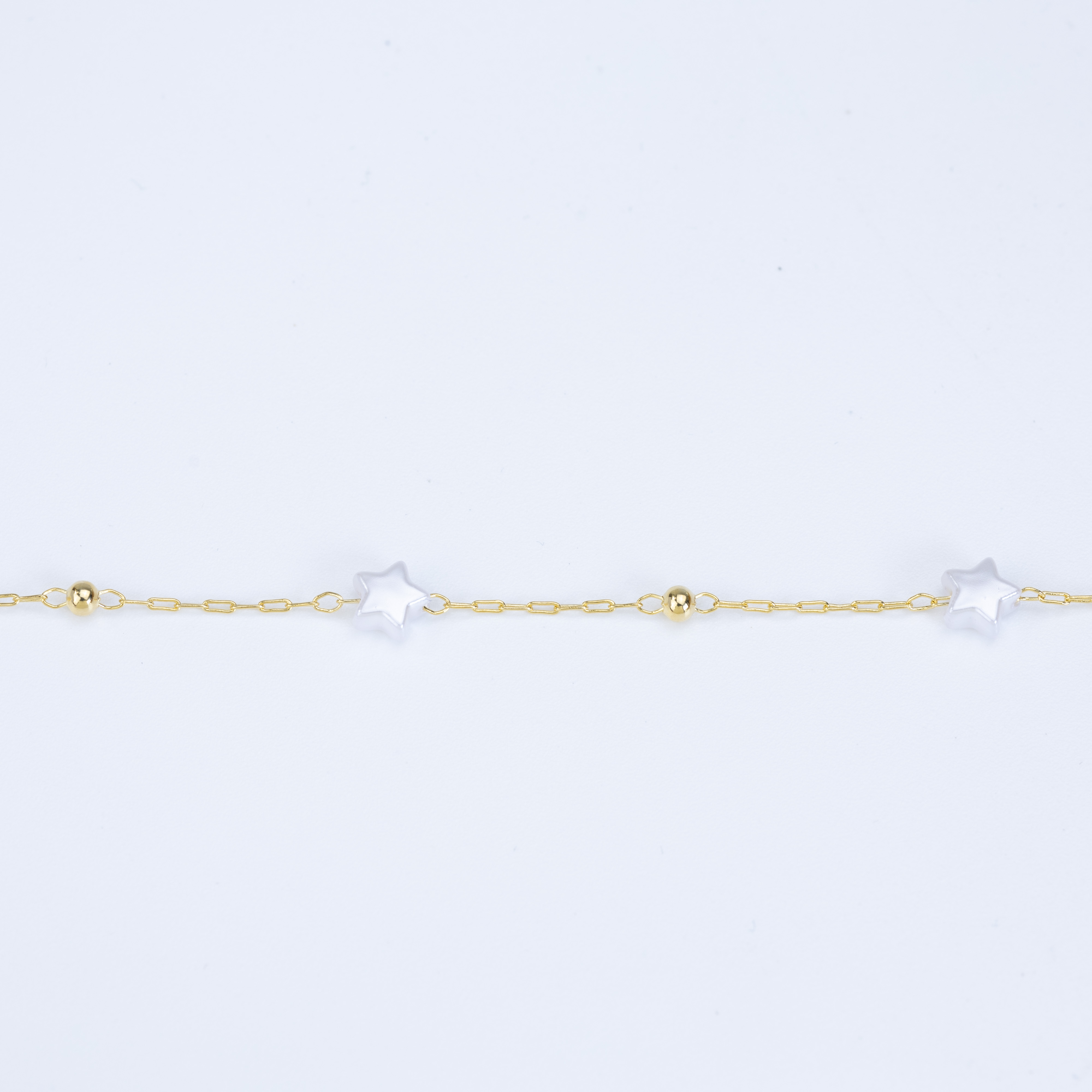 19767 Cadena Perlas Estrella 6.6MM con Bola 3mm