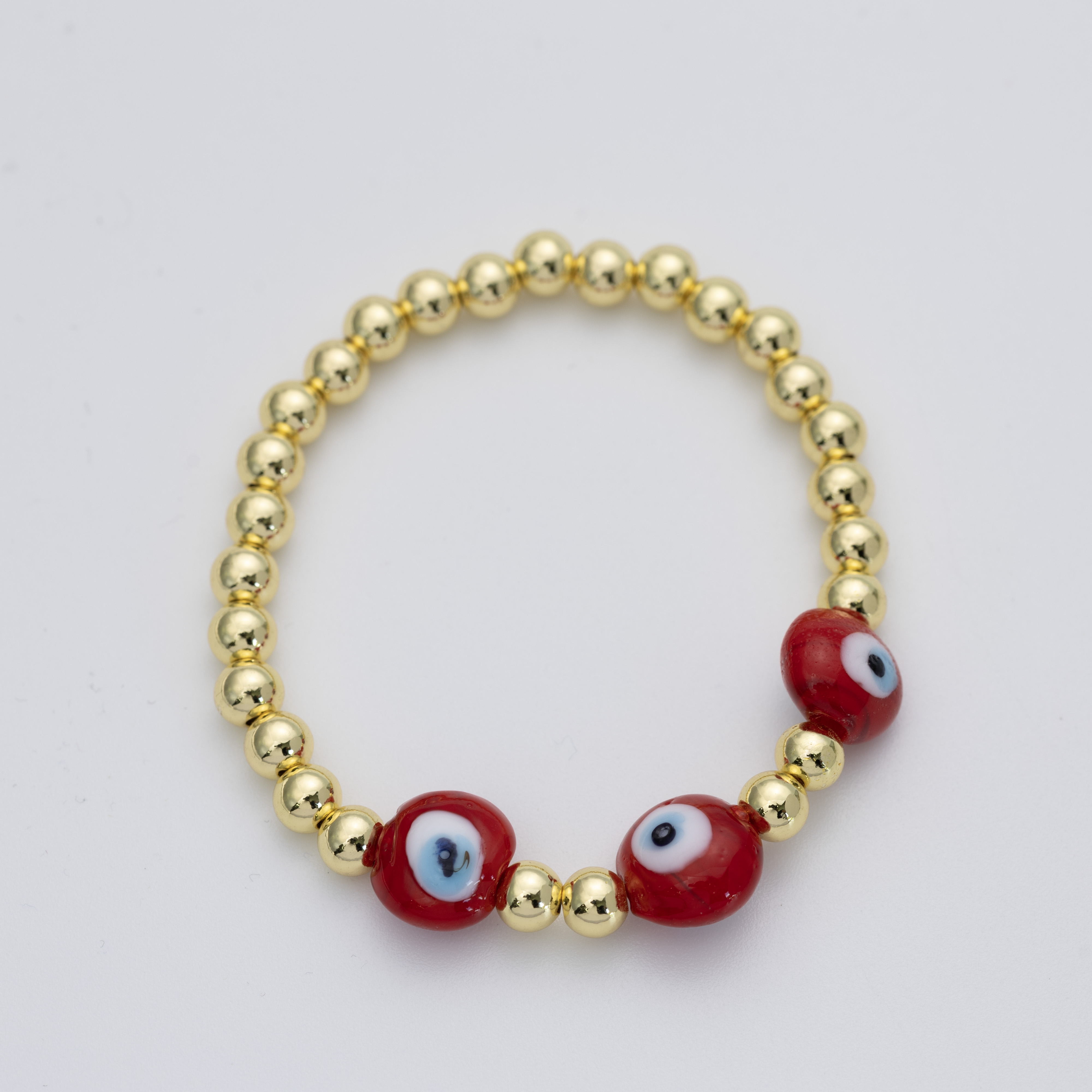 19483 5mm Gold Beaded Bracelet with Red Evil Eye Charms