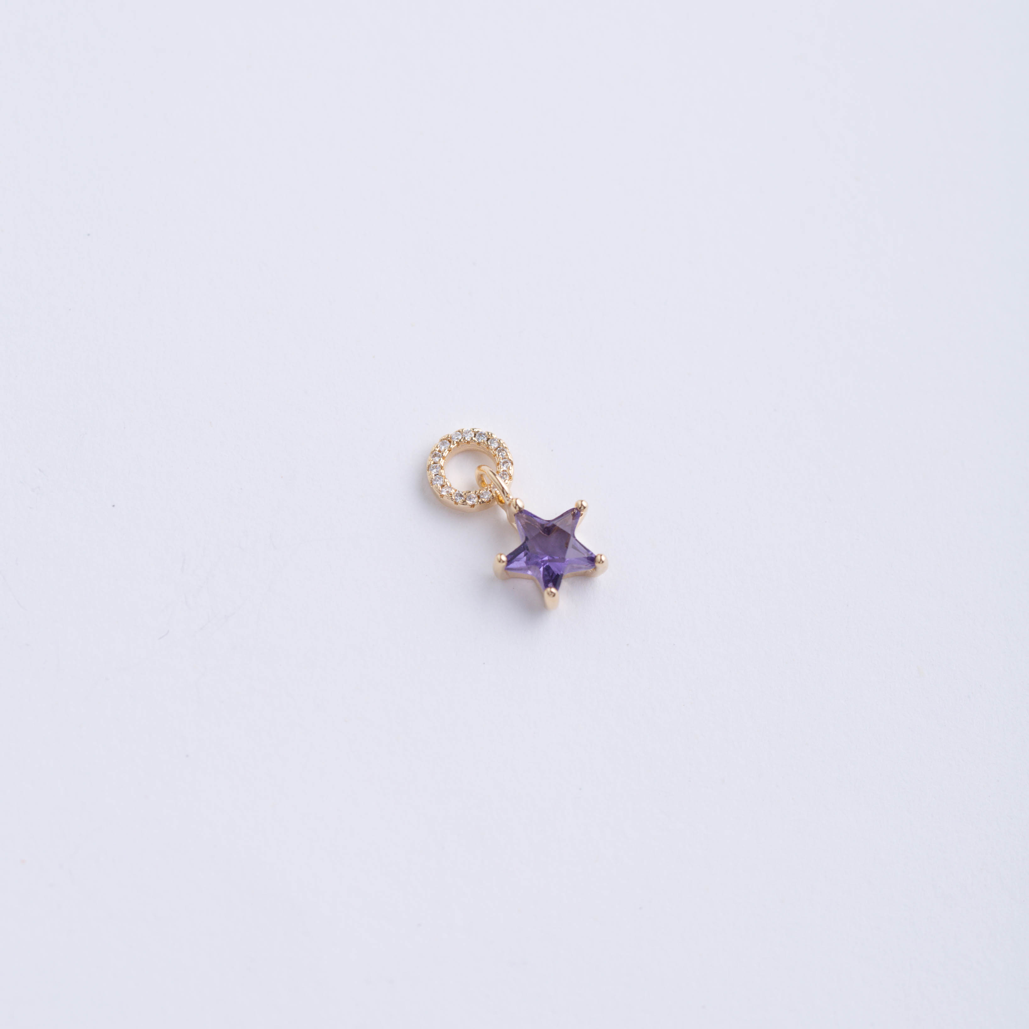 18042 Dijes Estrella de Zirconia Morada